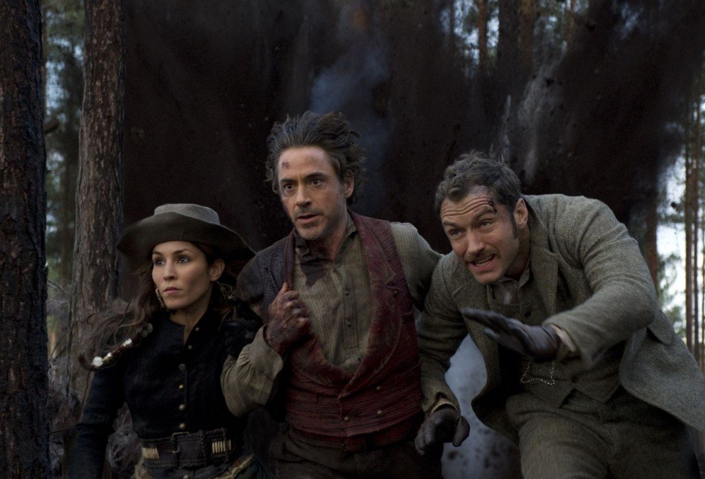 Noomi Rapace, Robert Downey Jr., and Jude Law star in SHERLOCK HOLMES: A GAME OF SHADOWS.